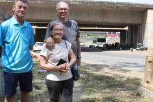 Gary Smith, Pat Smith, and Keith Smith discuss their concerns over homeless people and waste pickers living under Connaught Bridge.