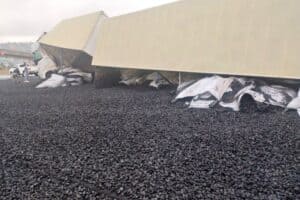 JUST IN: N12 highway closed after truck loses load of coal on wet highway