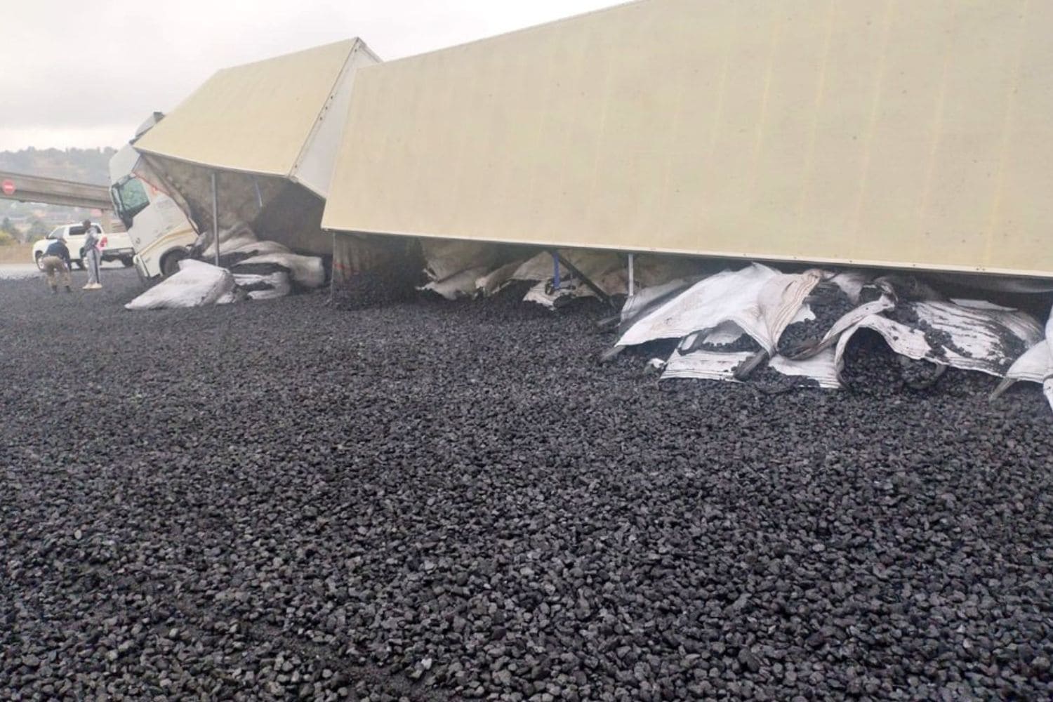 JUST IN: N12 highway closed after truck loses load of coal on wet highway