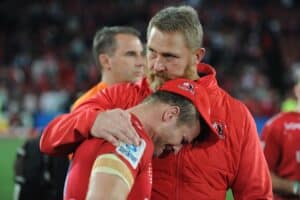 Former Lions coach Johan Ackermann comforts Jaco Kriel after losing to the Crusaders during the 2017 Super Rugby Final at Ellis Park.