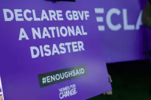 Purple ribbons demand real change