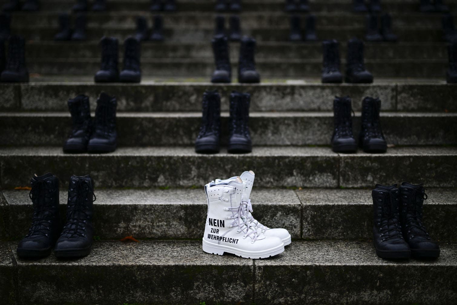 The lettering 'No to compulsory military service'