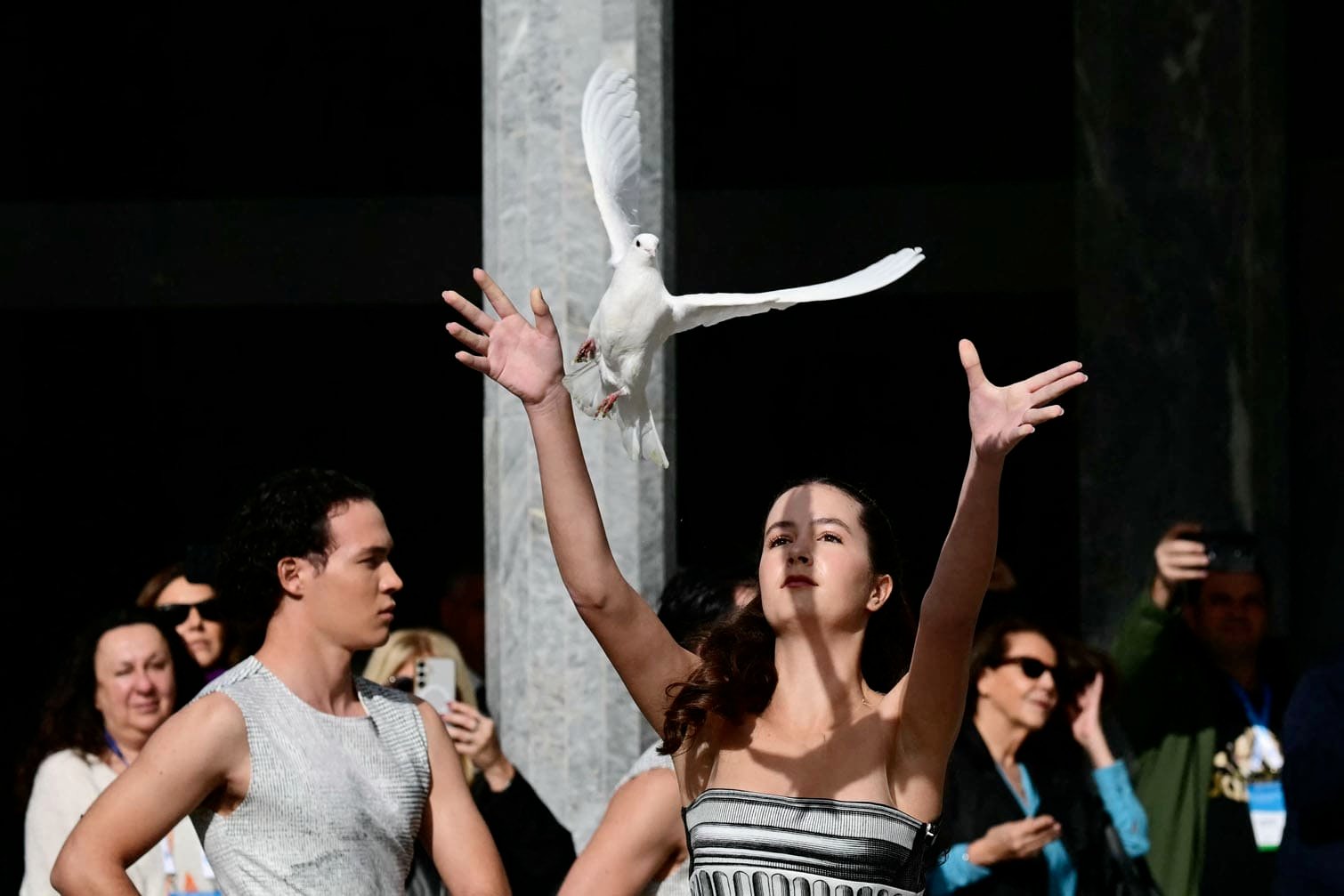 An actress releases a dove
