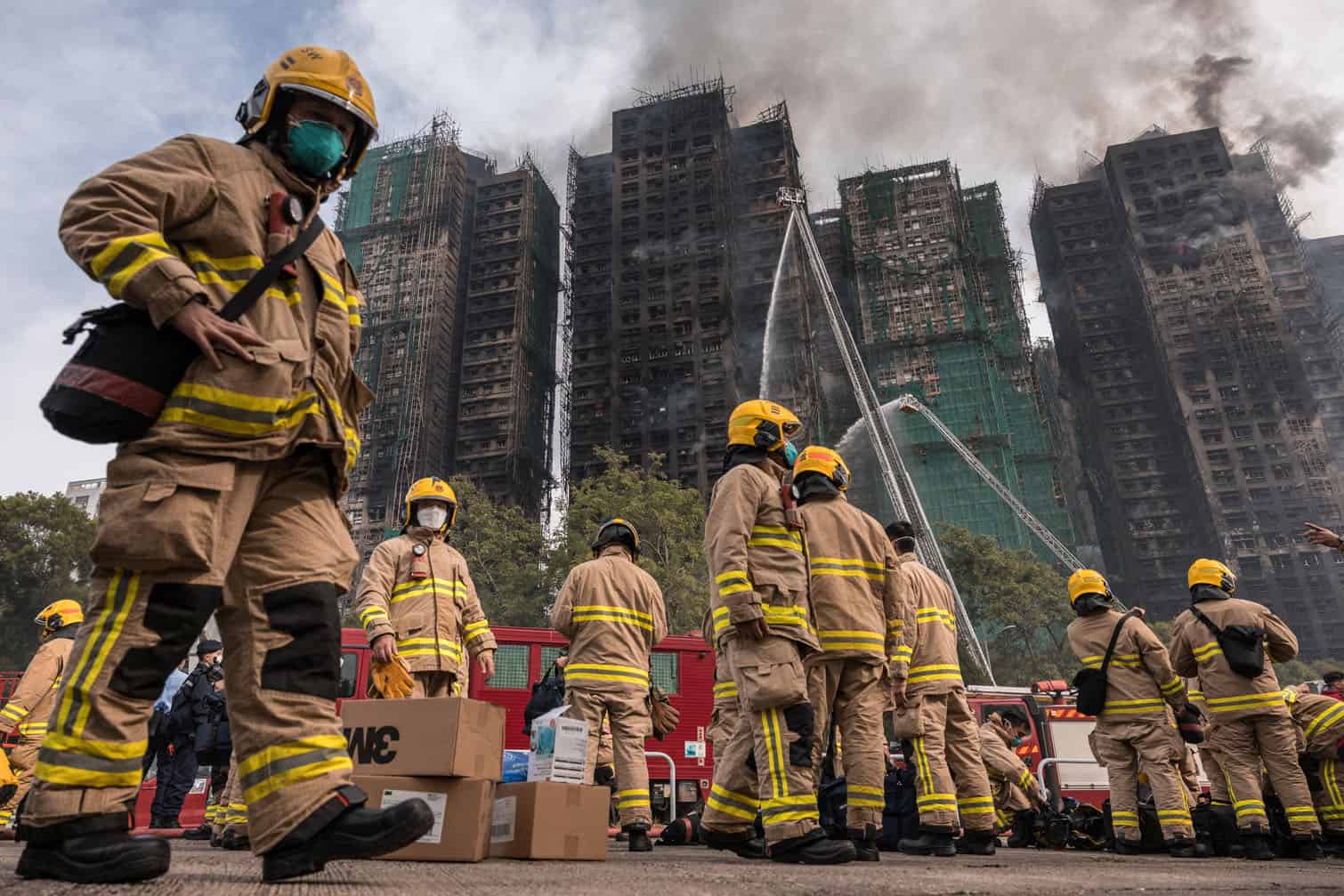Firemen get ready after a major fire