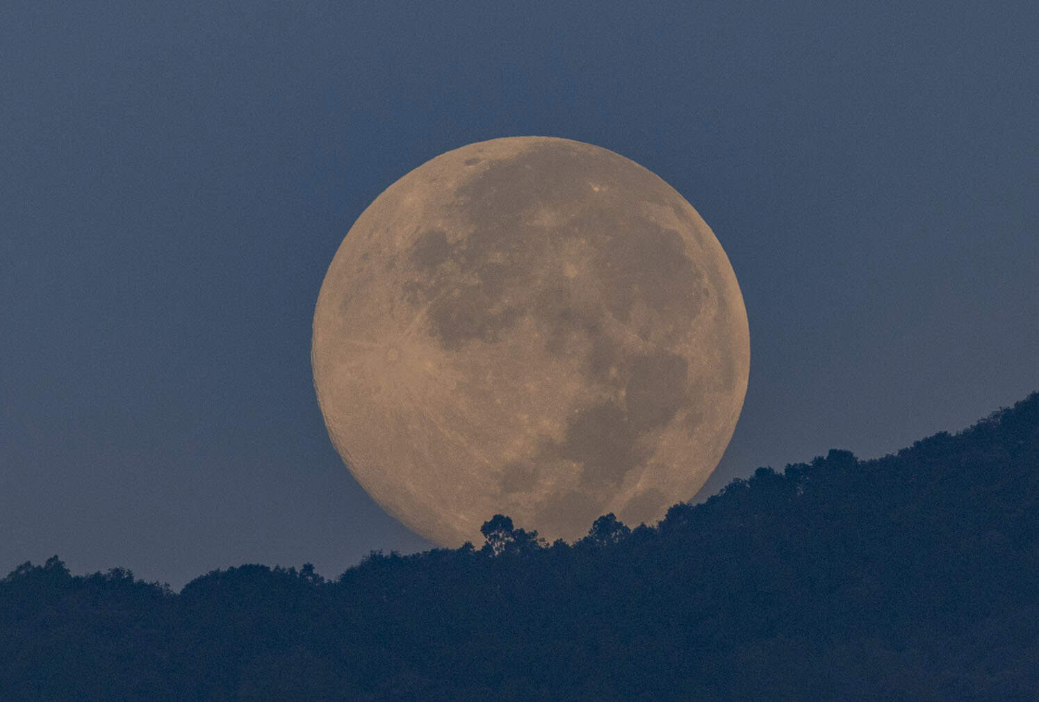 Full moon rises over the hills in Kathmandu