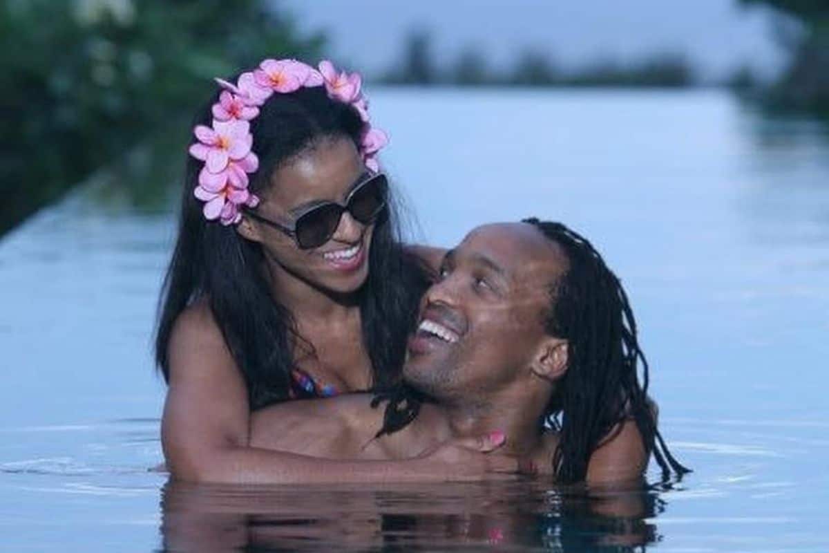 Odwa Ndungwane and his wife, Kgomotso in a lake