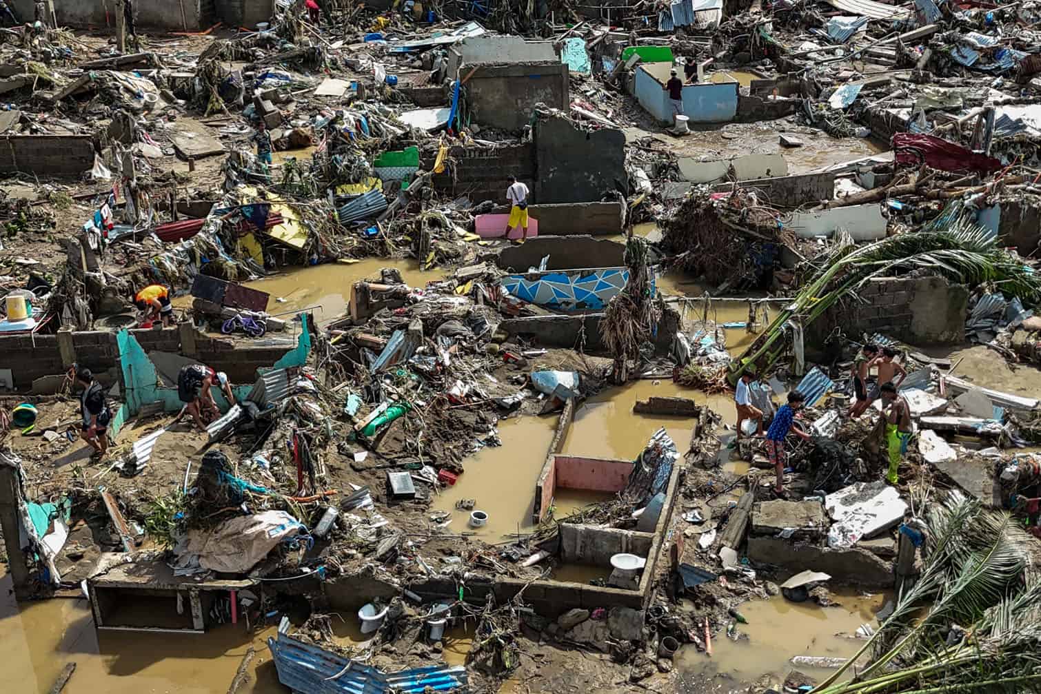 This aerial photo shows damaged houses in the aftermath of Typhoon Kalmaegi