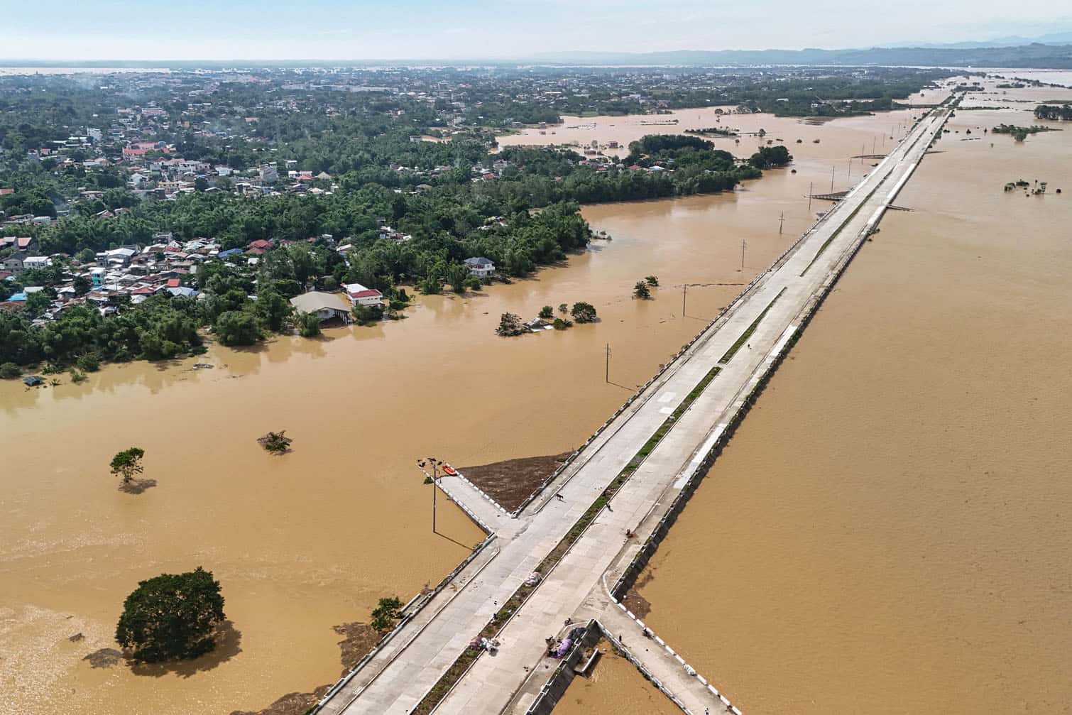 submerged under construction road with flood waters