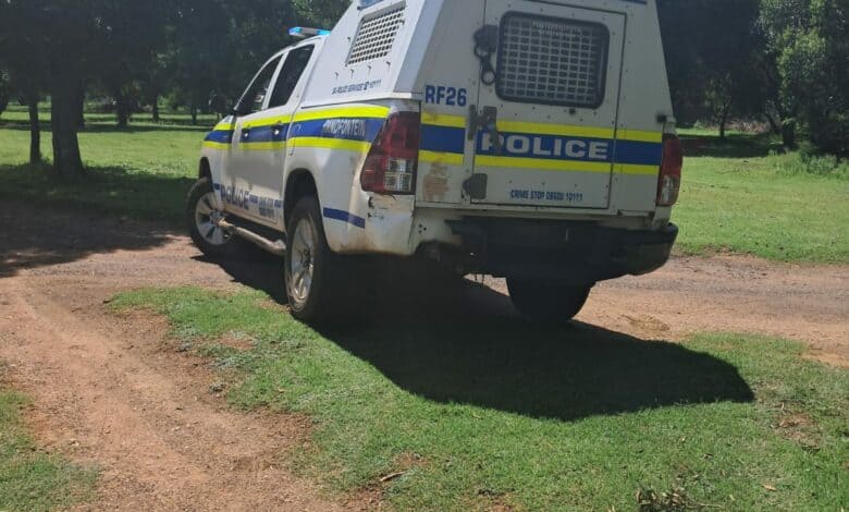 Police on the scene where the dog was shot.