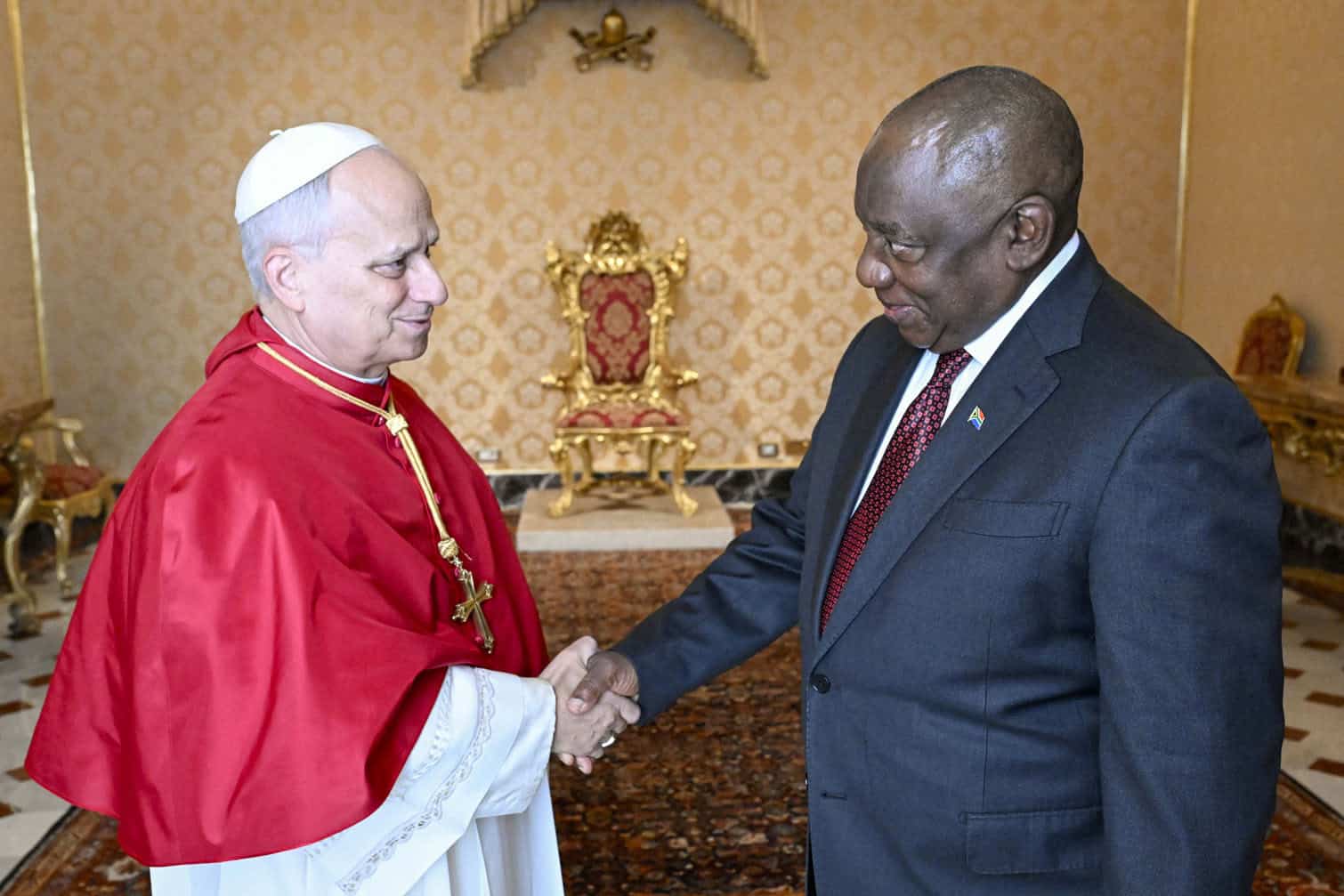 Pope Leo XIV shaking hands with Cyril Ramaphosa