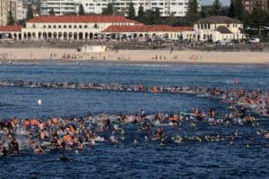 Australia announces gun buyback as swimmers mourn Bondi shooting victims