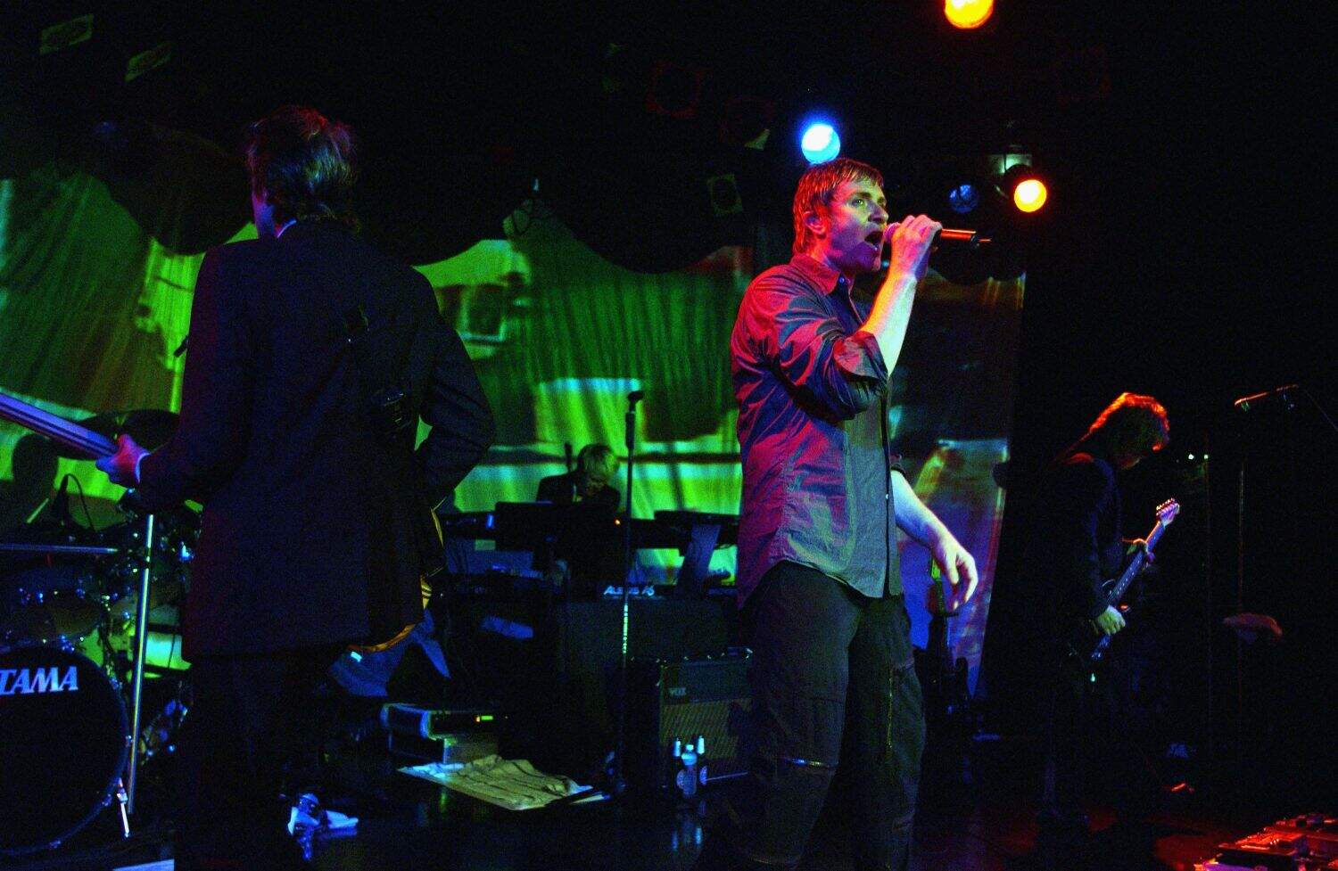 The five original members of Duran Duran perform onstage at their celebrity-filled gig at The Roxy Theater on July 15, 2003 in Hollywood, California. The show was one of the first in 18 years to feature all five original band members. Picturee: Getty Images via AFP