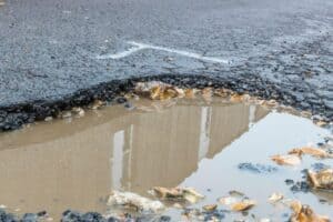 Tips to avoid pothole damage