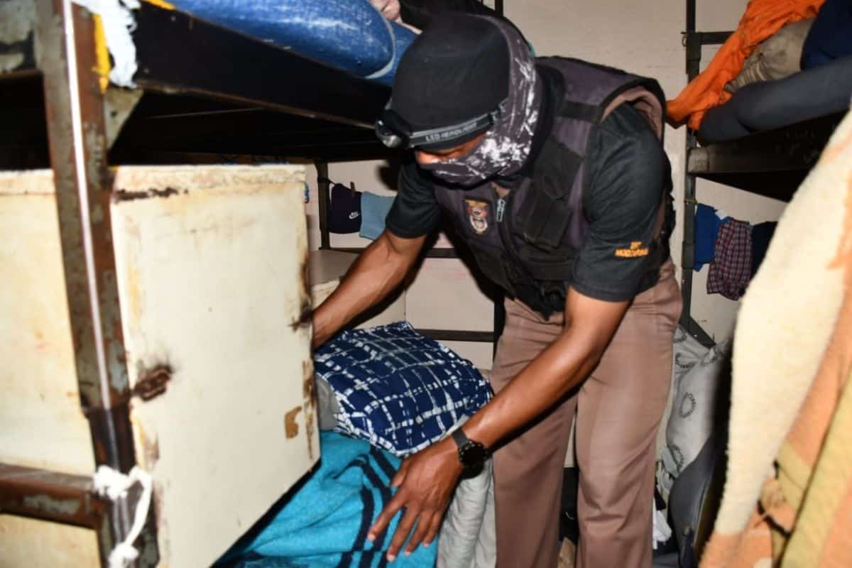 A correctional services official during at raid this week. Picture: The Department of Correctional Services/Facebook