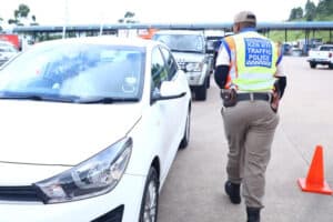 Traffic police conducting traffic stops at the Marianhill Toll Plaza.