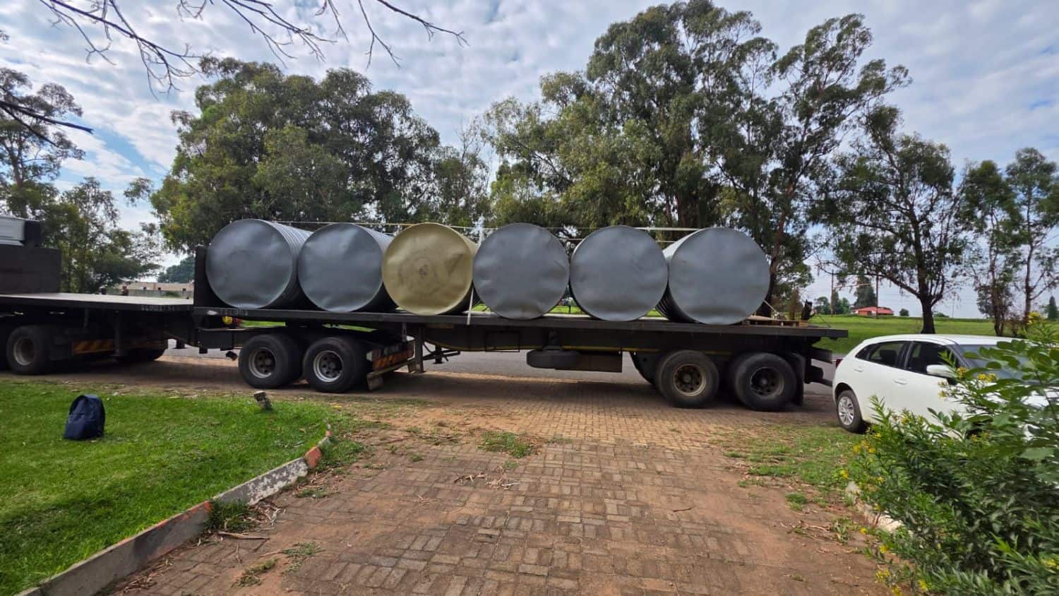 Police stopped a truck carrying 12 water tanks after being tipped off about illicit cigarettes being transported. Picture: Supplied/Saps
