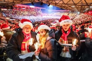 Fans sing traditional christmas carols at 1. FC Union Berlin football club stadium