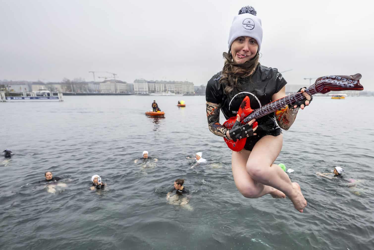 Thousands brave Lake Geneva's cold-water for traditional Christmas swim