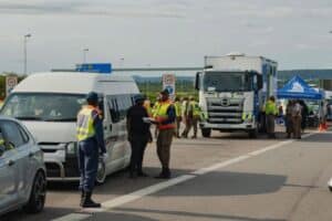 Gauteng traffic officers stop and check motorists at a festive season roadblock, cracking down on drunk driving, unroadworthy vehicles, and drivers without valid licences.