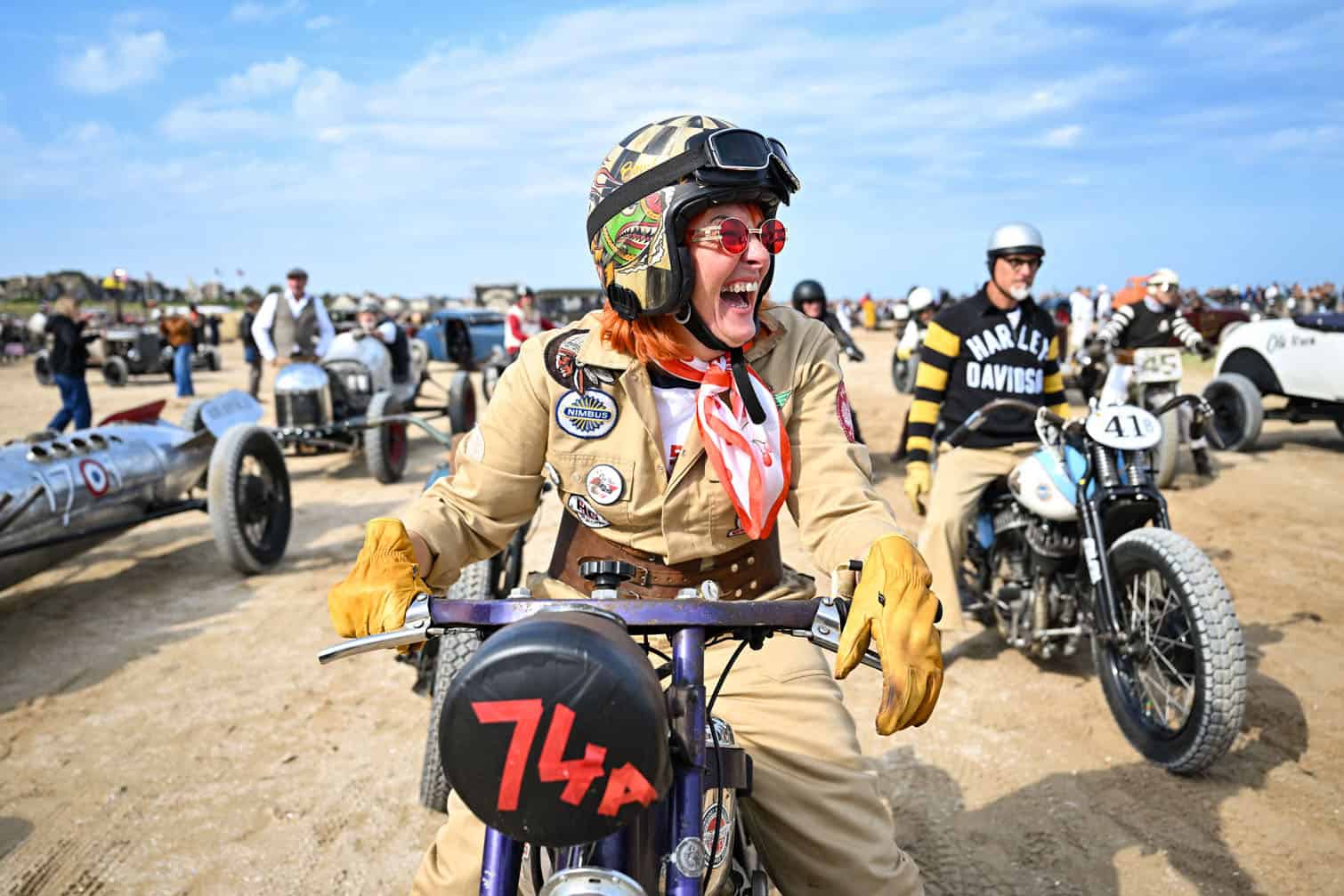 A rider laughs at the start of the 5th edition of the Normandy Beach Race