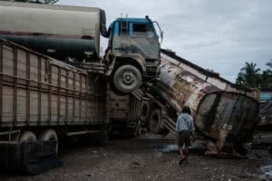 Palm oil tankers lie in a damaged state