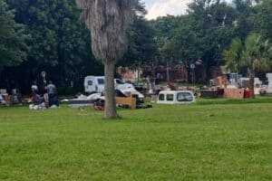 Illegal occupants’ furniture was left on the side of the street following forced removal from hijacked homes.