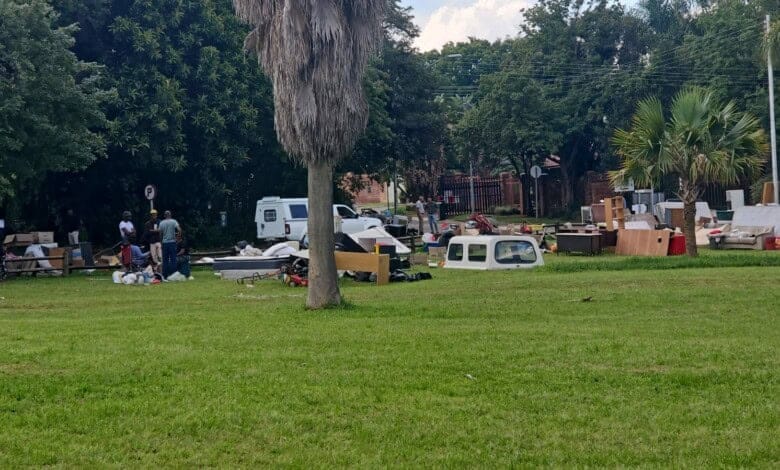 Illegal occupants’ furniture was left on the side of the street following forced removal from hijacked homes.