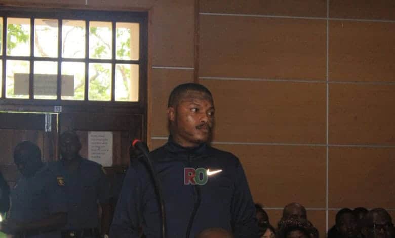 Members of the public and media gather in court as the investigating officer opposes bail for Shebeshxt.