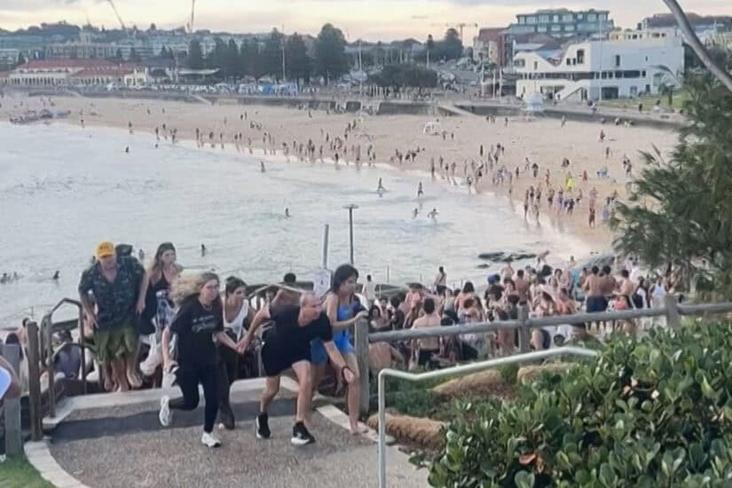 beach-goers fleeing Bondi Beach