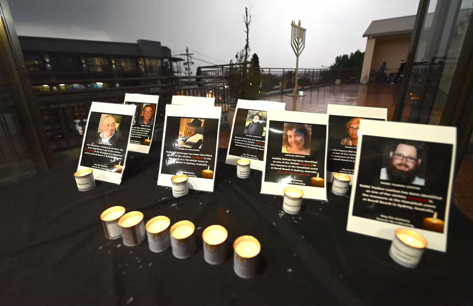 A memorial table with some of the victims of the shooting in Australia
