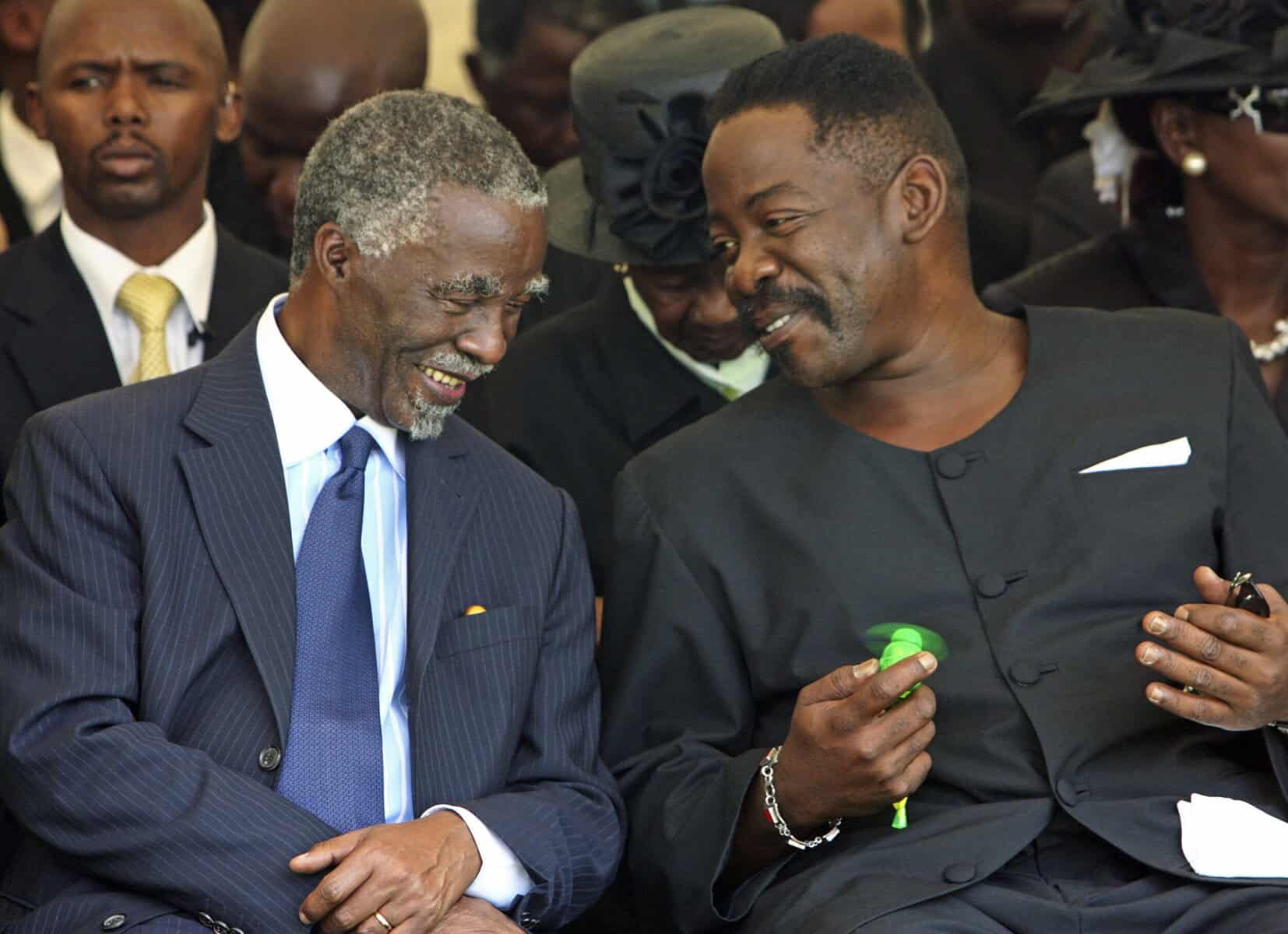 Former president Thabo Mbeki sharing a light moment with Dali Tamob at Adelaide Tambo's funeral on 11 February 2007 .Picture: Gallo/Getty Images