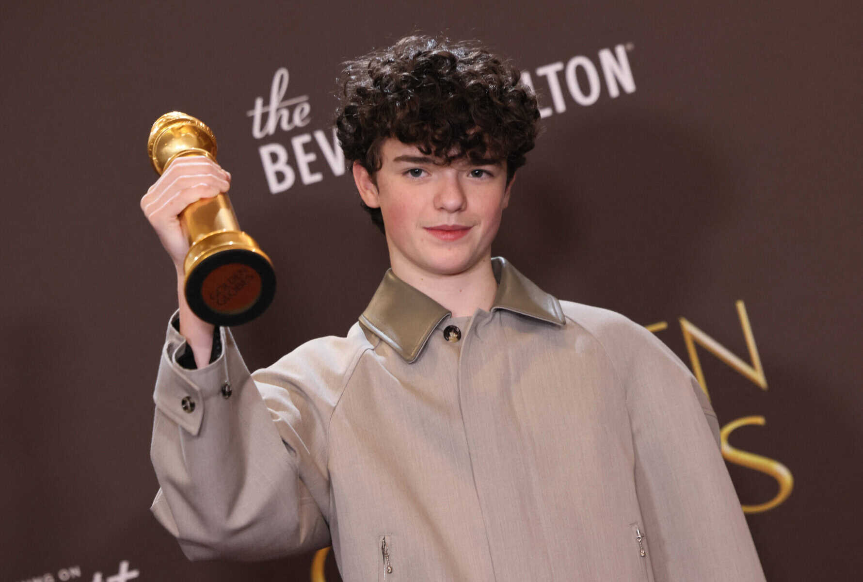 British actor Owen Cooper poses in the press room with his award Best Supporting Actor  Television for "Adolescence" during the 83rd annual Golden Globe Awards at the Beverly Hilton hotel in Beverly Hills, California, on January 11, 2026. (Photo by Etienne LAURENT /AFP)