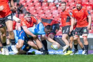 Bulls centre Harold Vorster scores against Lions