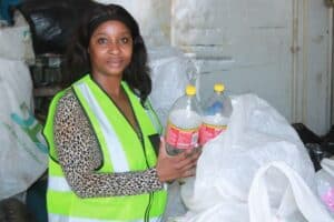 Kabelo Sebiloane inside the container, where she currently operates her recycling company.