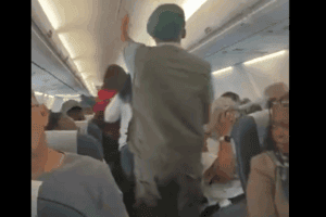 EFF supporters aboard a flight to East London. Picture: Screenshot