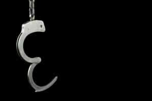 Parolee arrested for attempting to smuggle drugs and a cellphone into prison cells