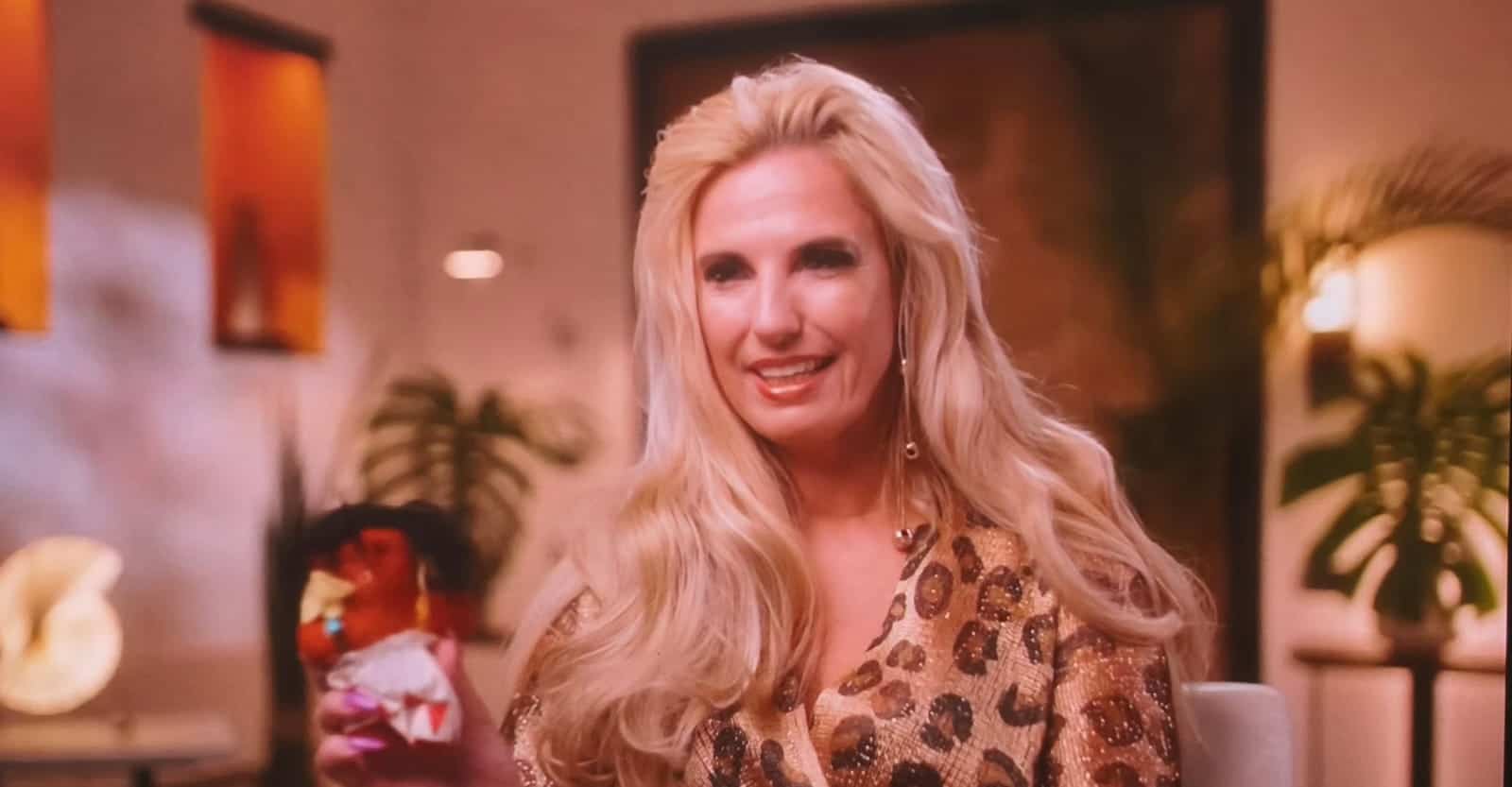 Women holding a Voodoo Doll