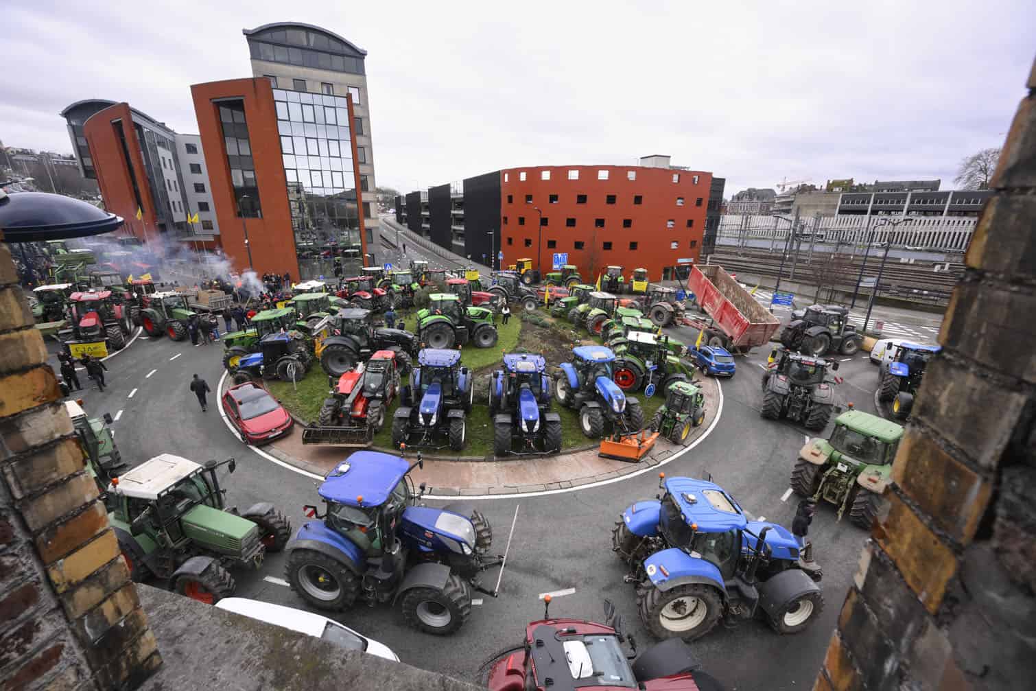 This photograph shows shows tractors parked at a roundabout