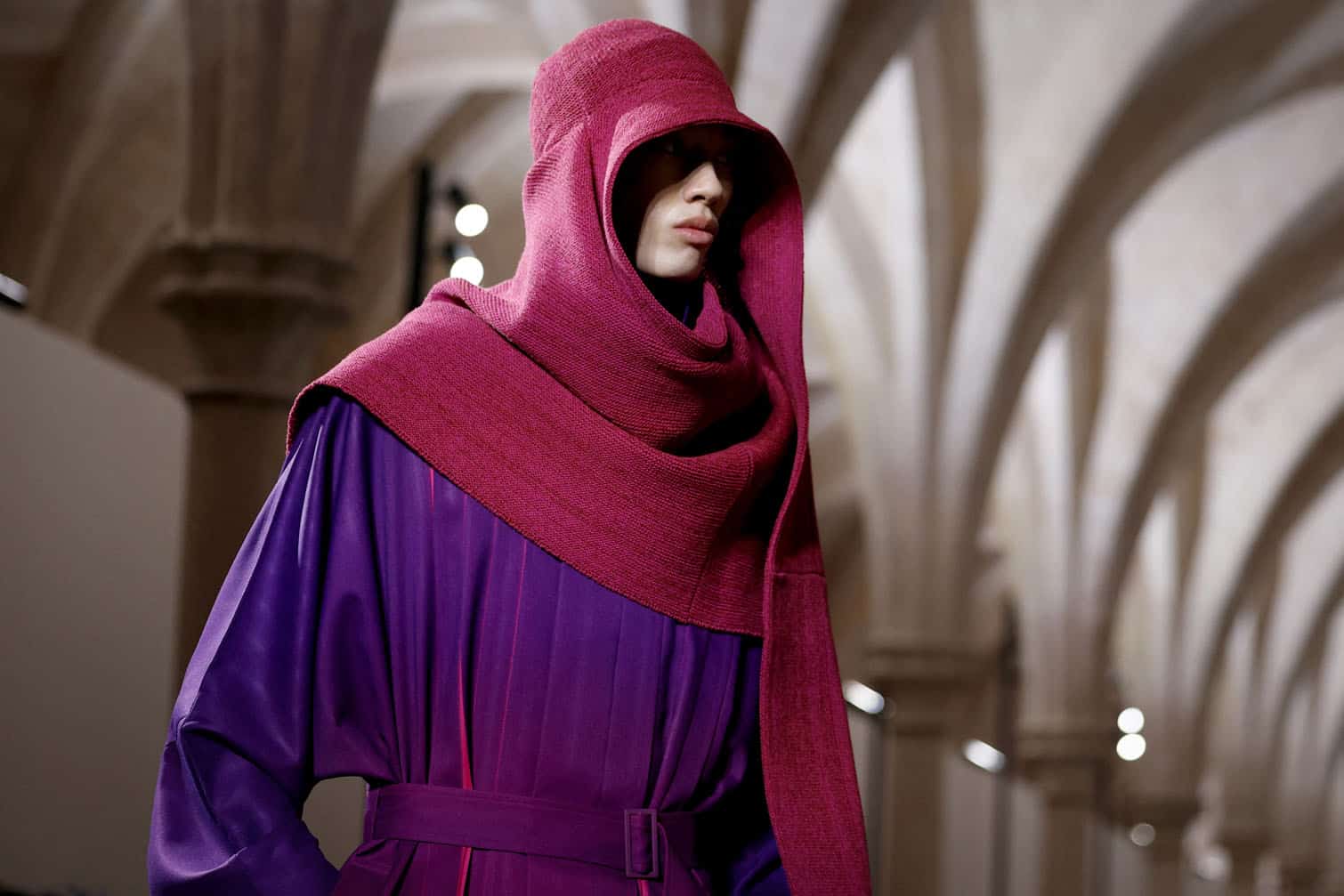 A model presents a creation by Issey Miyake