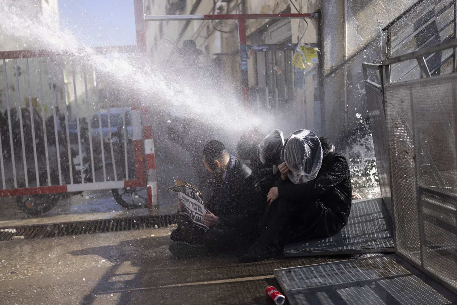 Israeli police use a water cannon