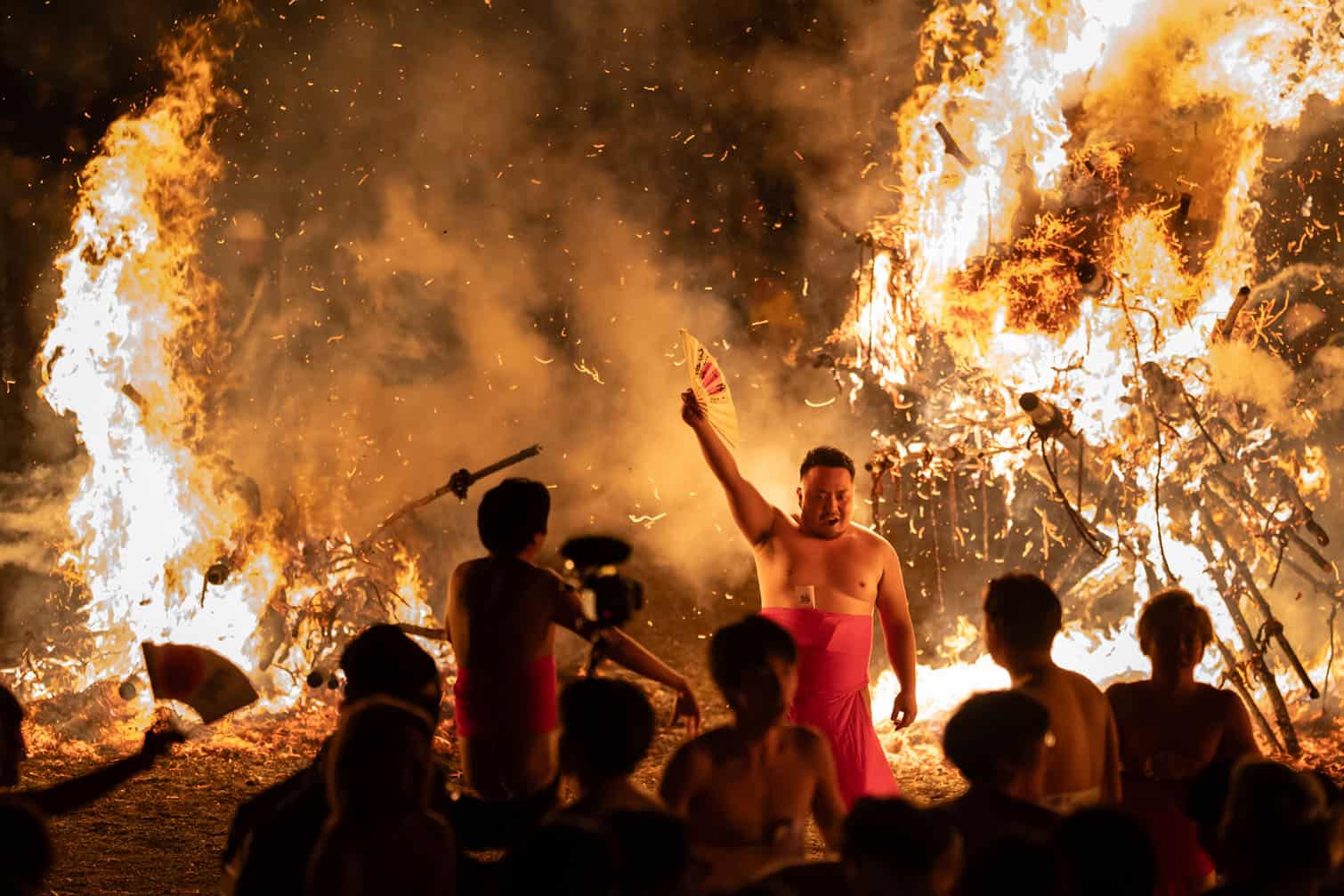 Participants take part in a fire festival