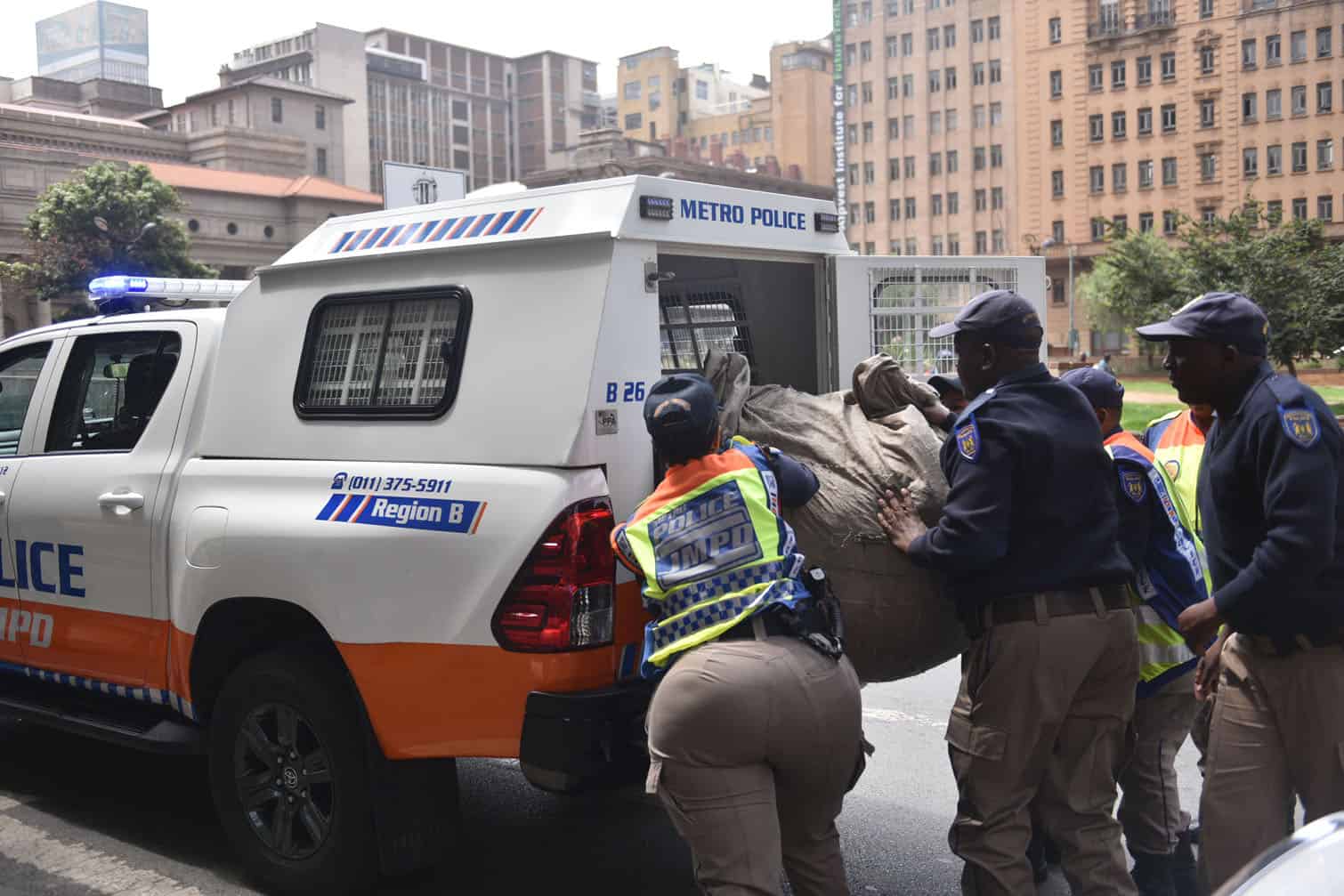 Johannesburg Metro Police load confisticated goods