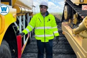 Liberty Coal CEO Hlayiseka Chauke receiving the initial batch of Liberty Mining Services’ yellow plant fleet at Optimum Colliery in December 2025.