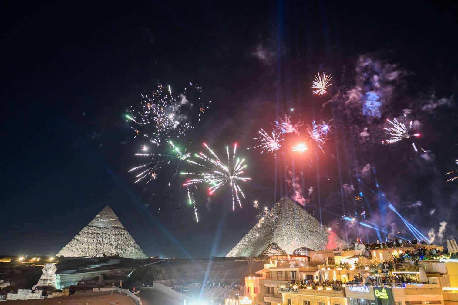 Fireworks light up the sky above the Great Pyramids of Giza