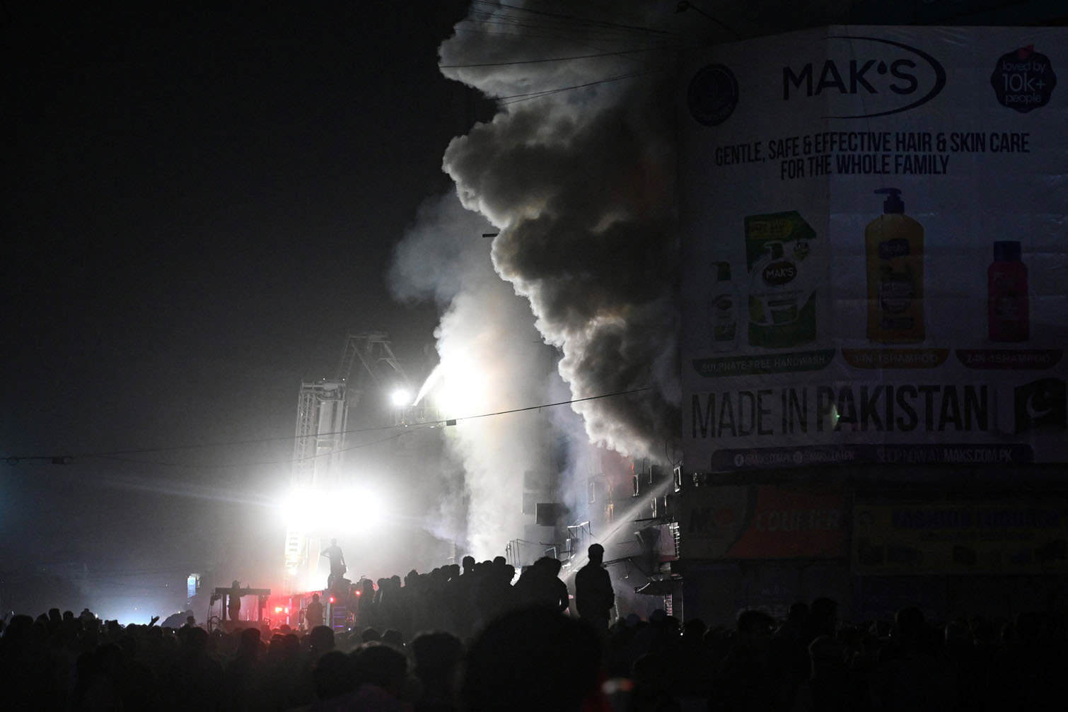 Firefighters douse a fire