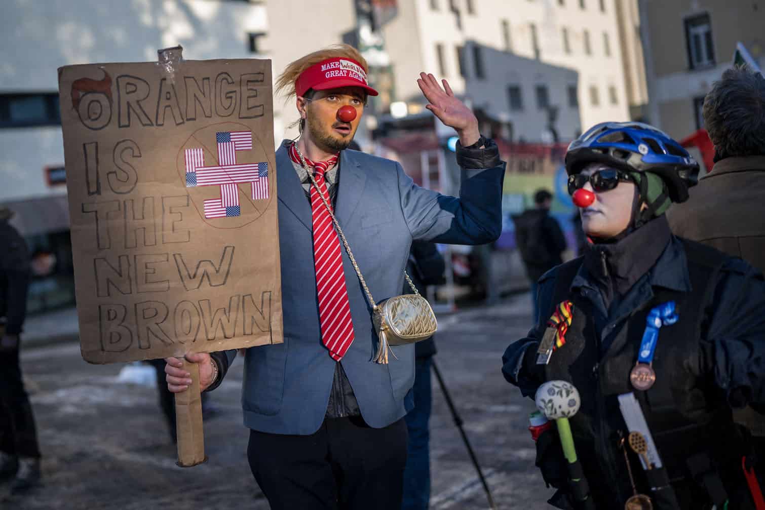 Protesters take part in a demonstration against the World Economic Forum