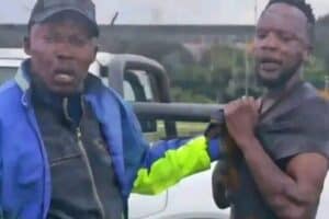 Screenshot from the video making rounds showing taxi patrollers assaulting a motorist.