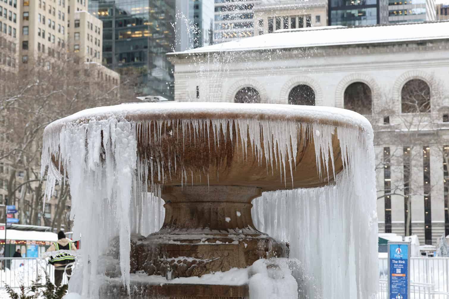 Ice is seen on a fountain in Bryant Park