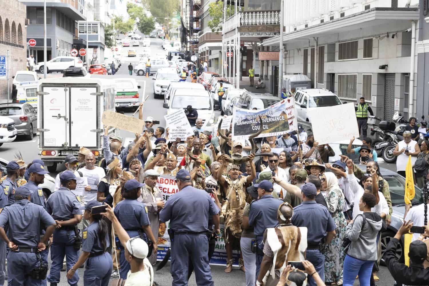 Various groups protest against the City of Cape Town's planned land auction during a march from Good Hope Centre to Cape Town High Court on 24 February 2026. The City of Cape Town plans to auction off 50 parcels of City-owned land on 26 February. Picture: Gallo Images/ER Lombard