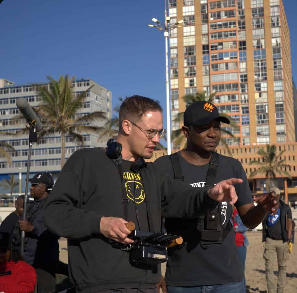 Director Michael James and Lungani Malo on the set of 'God's Work'